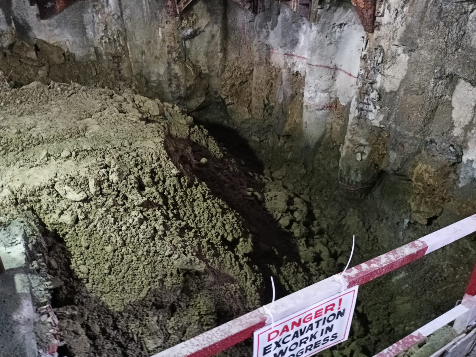 Excavation for intermediate mezzanine at Grant Road metro station